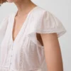 Top corto con peplo in voile di pizzo