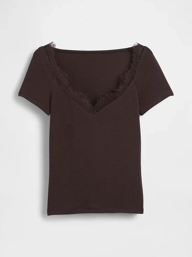 Top corto moderno con bordi in pizzo