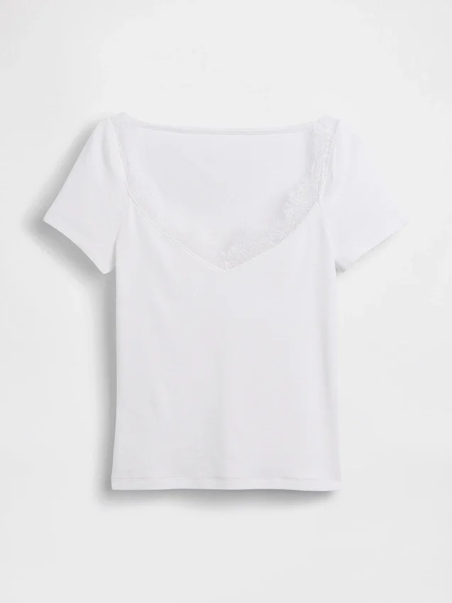 Top corto moderno con bordi in pizzo
