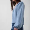 Top in denim con maniche a sbuffo