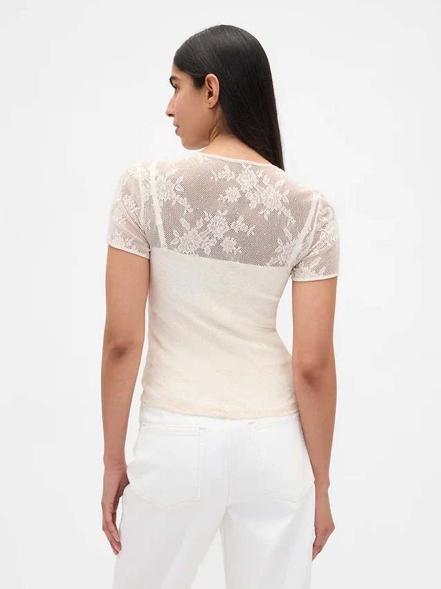 Top in rete con pizzo floreale