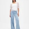 Top in tulle trasparente ricamato