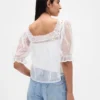 Top in tulle trasparente ricamato