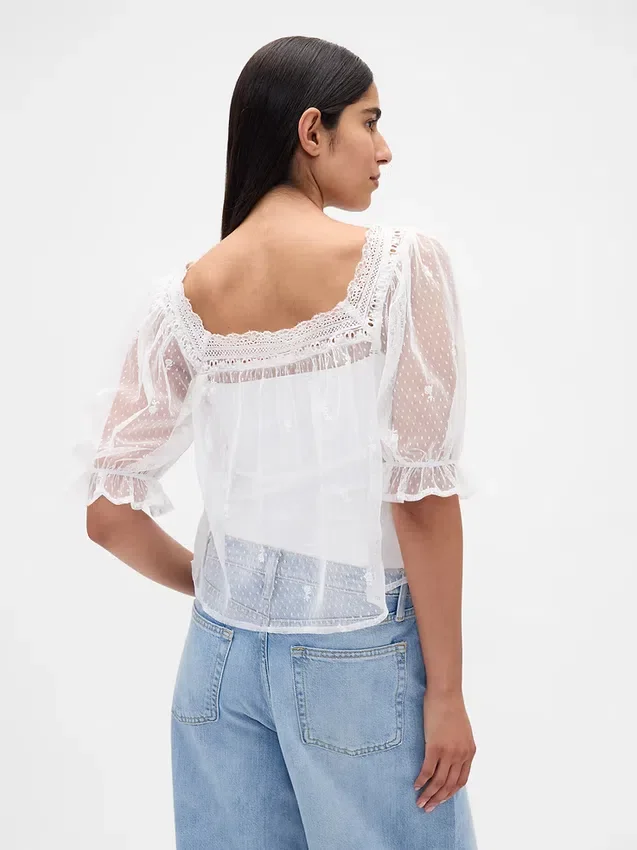 Top in tulle trasparente ricamato