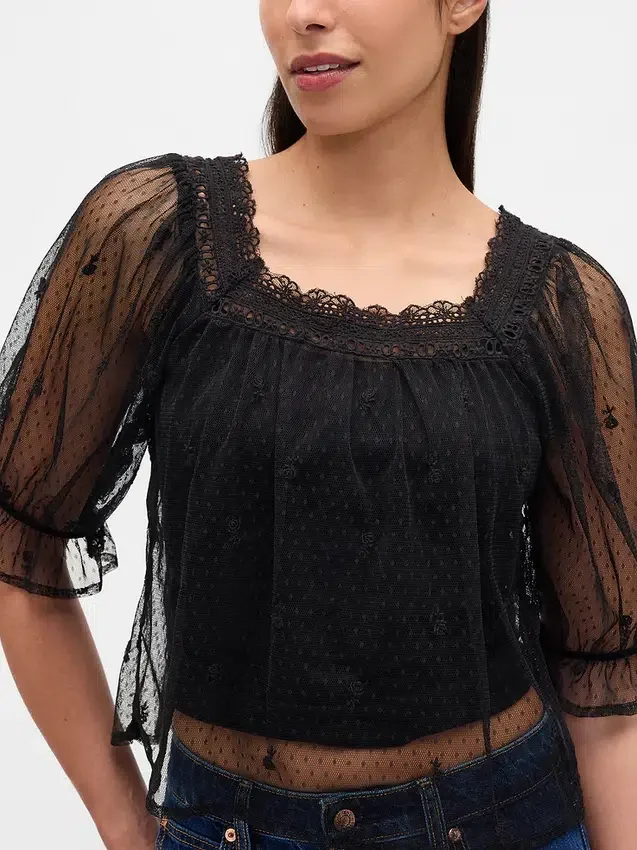 Top in tulle trasparente ricamato