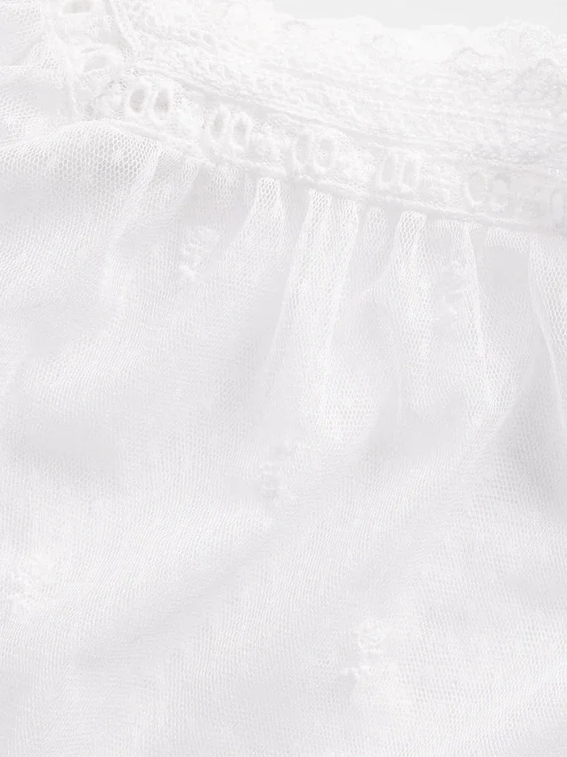 Top in tulle trasparente ricamato