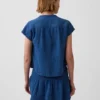 Top oversize in denim di garza di cotone con scollo a V