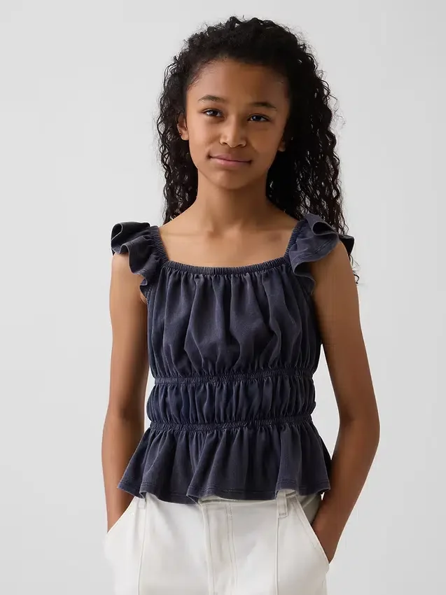 Top peplum smockato con maniche svolazzanti per bambini