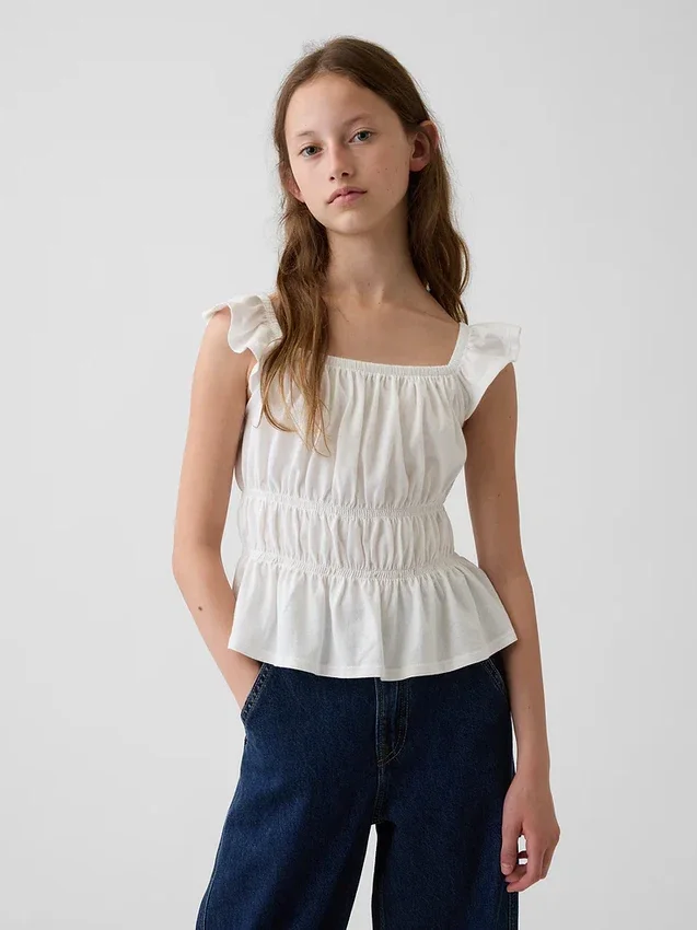 Top peplum smockato con maniche svolazzanti per bambini