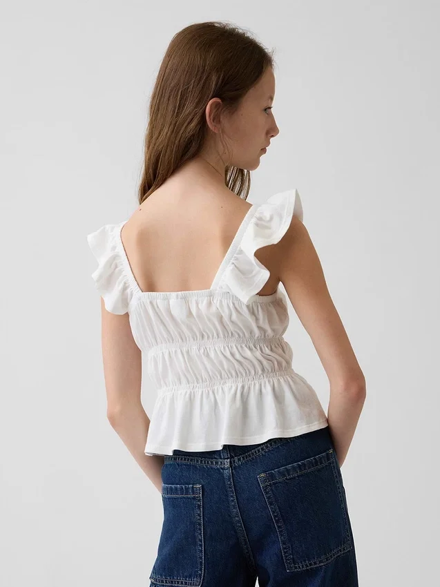 Top peplum smockato con maniche svolazzanti per bambini