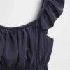 Top peplum smockato con maniche svolazzanti per bambini