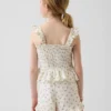 Top peplum smockato in garza di cotone per bambini
