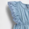 Tutina in denim con occhielli per neonati
