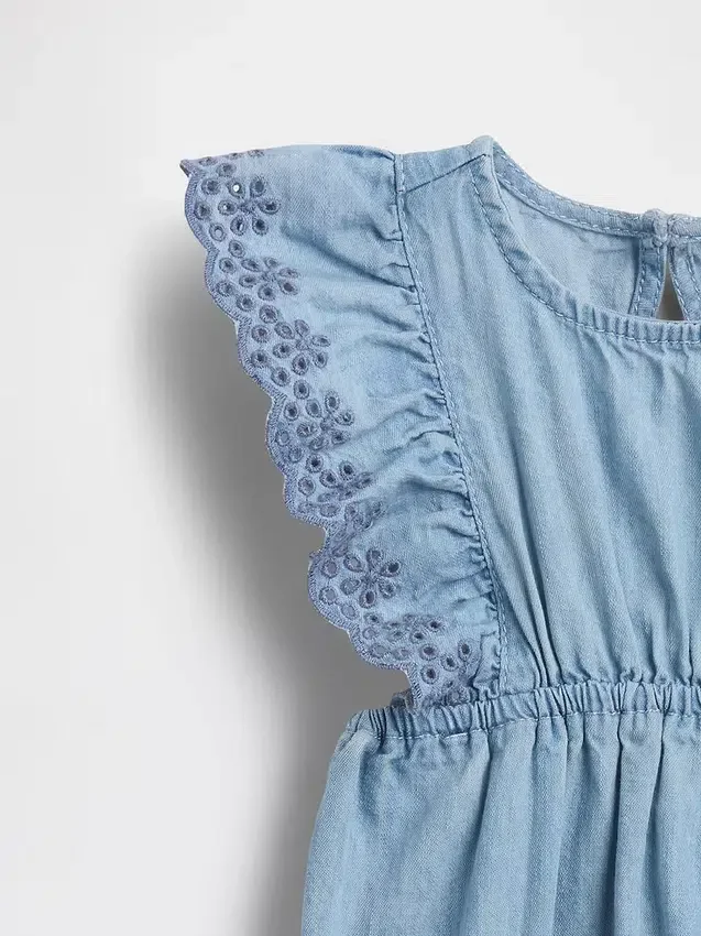 Tutina in denim con occhielli per neonati