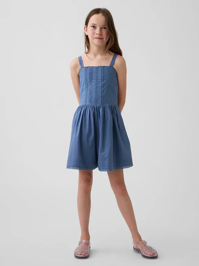 Tutina per bambini con bordi in pizzo