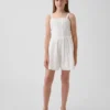 Tutina per bambini con bordi in pizzo