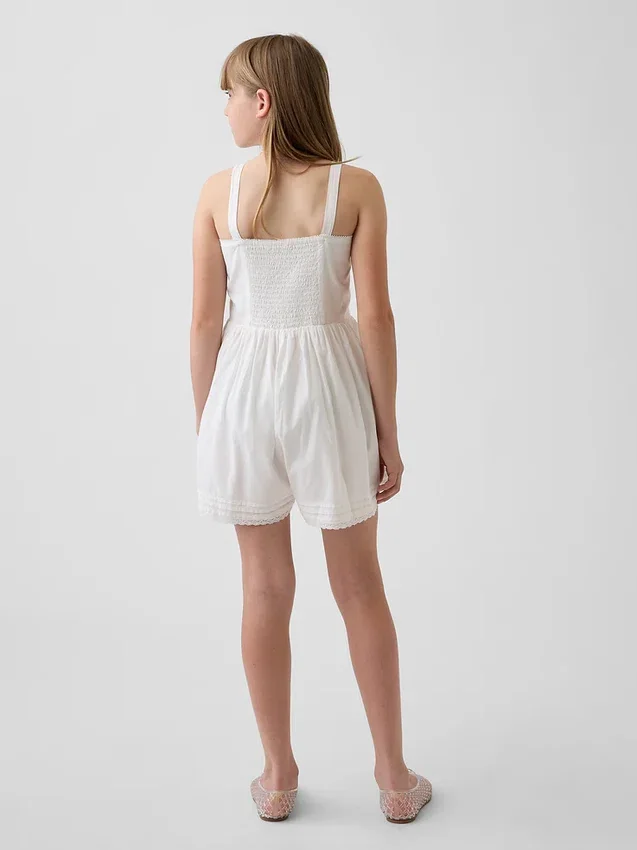 Tutina per bambini con bordi in pizzo