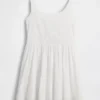 Vestito da bambina con ricami a occhielli