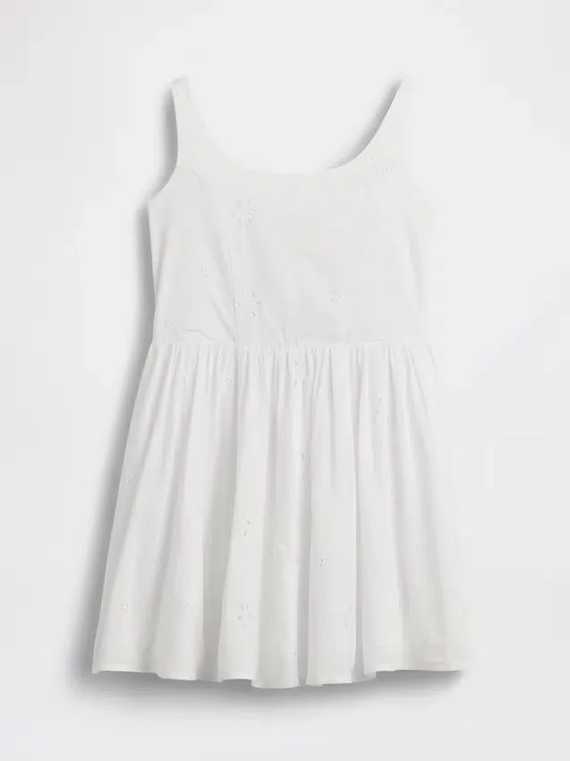 Vestito da bambina con ricami a occhielli
