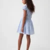 Vestito da bambina con stampa e smock