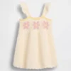 Vestito da neonato con fiori all’uncinetto