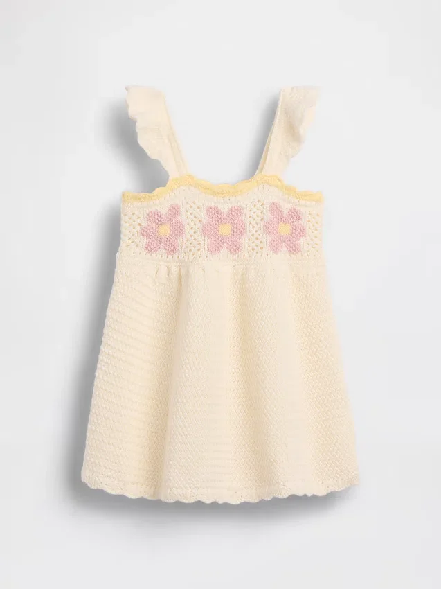 Vestito da neonato con fiori all’uncinetto