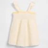Vestito da neonato con fiori all’uncinetto