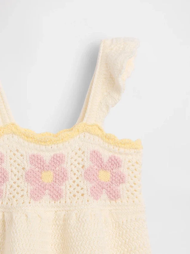Vestito da neonato con fiori all’uncinetto