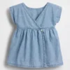 Vestito da neonato in denim con tasche ricamate