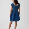 Vestito in denim per bambina con maniche a sbuffo