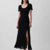 Vestito lungo con maniche a sbuffo ricamate