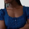 Vestito lungo con maniche a sbuffo ricamate
