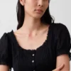 Vestito lungo con maniche a sbuffo ricamate
