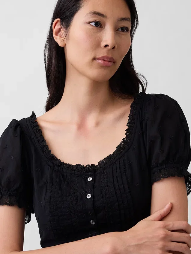 Vestito lungo con maniche a sbuffo ricamate