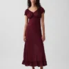 Vestito lungo con scollo a V e orlo con volant
