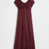 Vestito lungo con scollo a V e orlo con volant