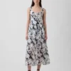 Vestito lungo con vita bassa e cuciture