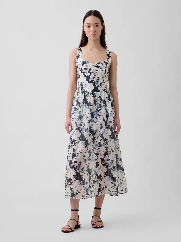 Vestito lungo con vita bassa e cuciture