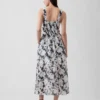 Vestito lungo con vita bassa e cuciture