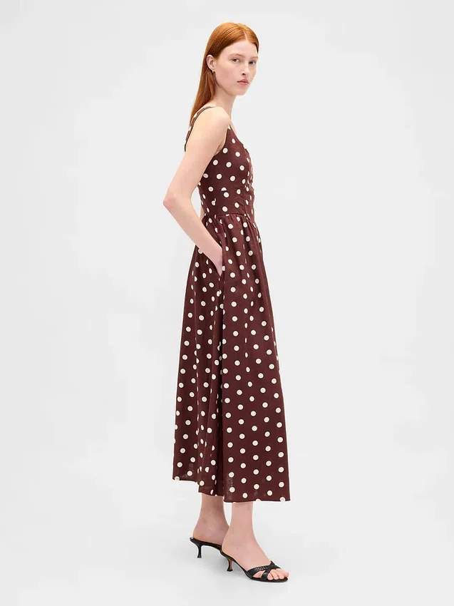 Vestito lungo con vita bassa e cuciture