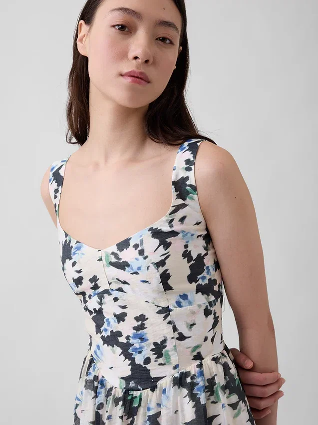 Vestito lungo con vita bassa e cuciture