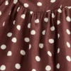 Vestito lungo con vita bassa e cuciture