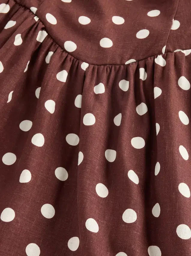 Vestito lungo con vita bassa e cuciture
