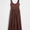 Vestito lungo con vita bassa e cuciture