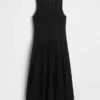 Vestito lungo con vita bassa e occhielli