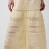 Vestito lungo in voile con volant in pizzo