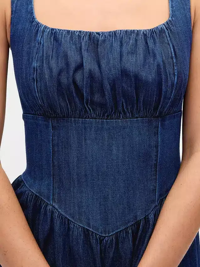 Vestito midi in denim con vita bassa e effetto corsetto