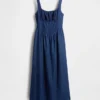 Vestito midi in denim con vita bassa e effetto corsetto