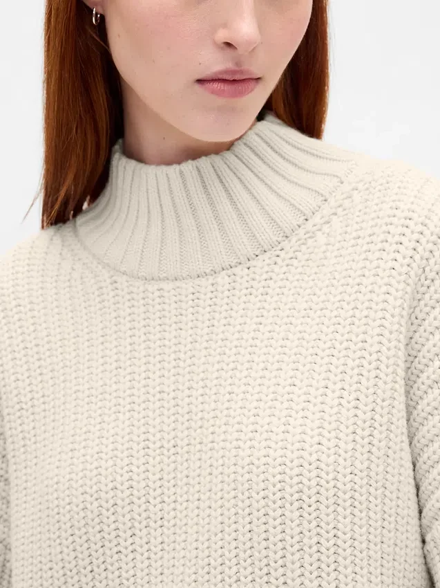 Vestito oversize a maglione con collo alto