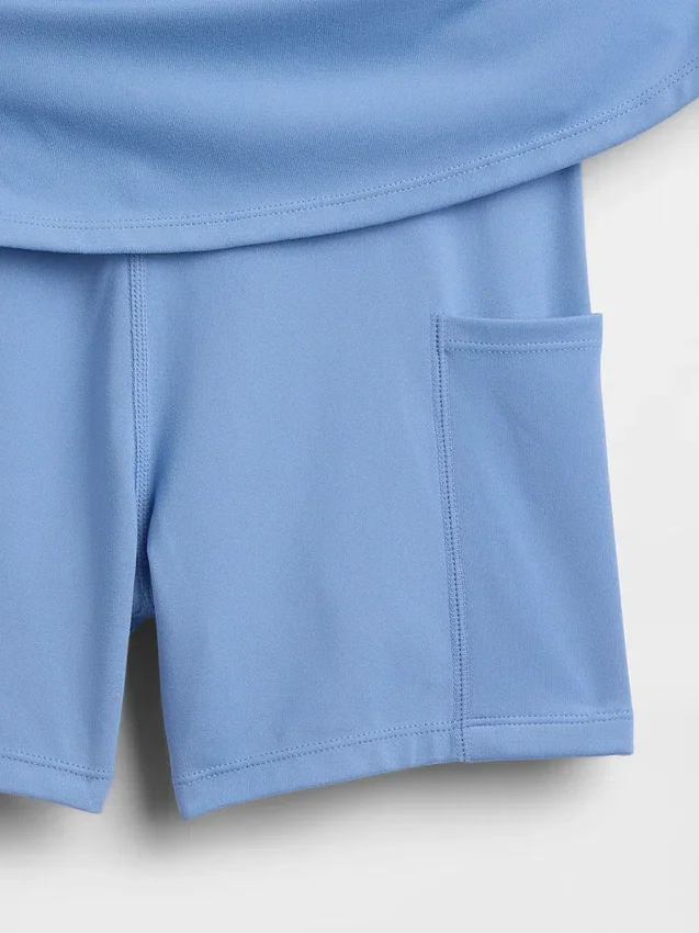 Vestito sportivo da bambina con maniche ad aletta